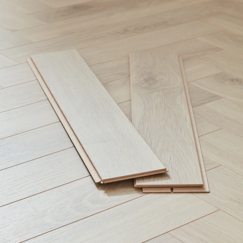 Berry Alloc Thirlmere Herringbone 8mm Laminate Flooring - Natural Sand - Image 4